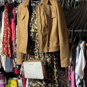 Tan Women's Jacket and leopard print jump suit GUCCI NECKLACE AND MK BAG.